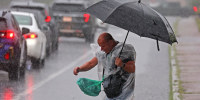 Heavy rain during morning commute floods I-93, temporarily closes part of Red Line, and prompts flash flood warnings