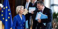 Ursula von der Leyen, left, and Maros Sefcovic speak to one another