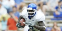 Kentucky Wildcats wide receiver Scott Mitchell holds the ball during a game.