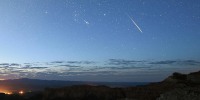 A meteor streaks across the sky over Bryce Canyon National Park in Utah during the annual Perseid meteor shower.