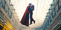 Superman, played by David Corenswet kisses Lois Lane, played by Rachel Brosnahan. 
