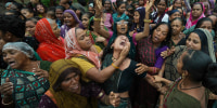 Family members and relatives of Akash Patni grieving during his funeral procession.