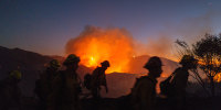 Firefighters in the growing Palisades fire on January 11. 