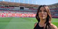 Eva Longoria  on the field.