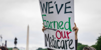 medicare protest sign