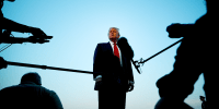 Donald Trump speaks with reporters
