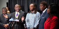William McNeil Jr listens as Ben Crump speaks.