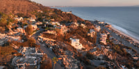 An aerial view of burned down homes in Malibu, Calif.