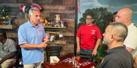 New Jersey Republican Jack Ciattarelli campaigns at El Primito, a Dominican restaurant in Passaic, N.J., in August.
