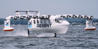 The REGENT Viceroy Seaglider, a winged passenger ferry, glides over the surface of Narragansett Bay