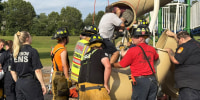 vernon firefighters rescue man from tube slide
