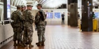 Image: Members of the National Guard patrol inside the Metro Center Metrorail Station