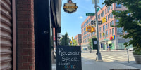 A sign outside Brooklyn coffee shop Clever Blend offers a $6 gelato and espresso “recession special.”