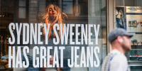 A window display of actress Sydney Sweeney is seen on a window of an American Eagle store from outside on the street