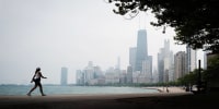 A woman walks along Chicago's lakefront on June 5, 2025.