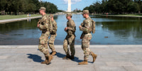 Members of the West Virginia National Guard patrol the National Mall