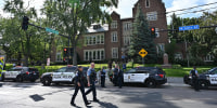 Police and first responders work at the scene of a shooting near Annunciation Church and Catholic School in Minneapolis, Minneosta, on August 27, 2025. 
