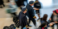 Pilots at airport.