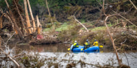 Search and Recover unit paddles along the Guadalupe River 