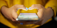 Image: Woman Typing Phone Message On Social Network At Night