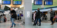 Travelers walk through the terminal at the Buffalo Niagara International Airport 