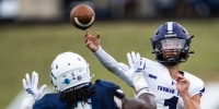 Dylan Hair throws a football