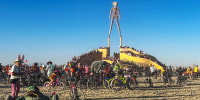 Attendees gather on the Playa at the Burning Man Festival in 2024.