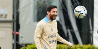 Lionel Messi practices soccer outside