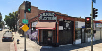 the exterior of Silver Platter bar during the daytime