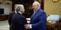 Belarusian President Alexander Lukashenko, right, and U.S. Presidential envoy John Coale