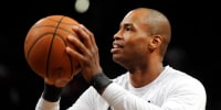 Jason Collins prepares to throw a basketball