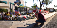 Arizonans mourn Charlie Kirk outside of the Turning Point USA headquarters on Sept. 12, 2025 in Phoenix.
