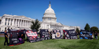 Image: Save HIV Funding Campaign Unveils #CutsKill AIDS Quilt
