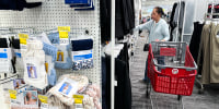 A person with a red Target shopping cart shops inside of Target