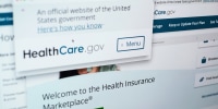 Pages from the U.S. Affordable Care Act health insurance website healthcare.gov are seen on a computer screen