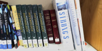 Bibles on library shelf