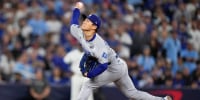 Los Angeles Dodgers pitcher Yoshinobu Yamamoto throws against the Toronto Blue Jays during the eighth inning in Game 2 of baseball's World Series.