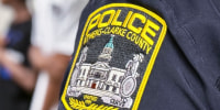 Close up of an Athens-Clarke County police officer's patch on the shoulder of their uniform