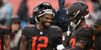 CLEVELAND, OHIO - OCTOBER 19: Quarterback Shedeur Sanders #12 talks with cornerback Dom Jones #37 of the Cleveland Browns before the game against the Miami Dolphins at Huntington Bank Field on October 19, 2025, in Cleveland, Ohio. The Browns defeated the Dolphins 31-6. (Photo by Jason Miller/Getty Images)