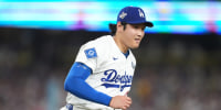 Oct 28, 2025; Los Angeles, California, USA; Los Angeles Dodgers two-way player Shohei Ohtani (17) reacts after throwing to first for an out against Toronto Blue Jays third baseman Addison Barger (47) in the sixth inning during game four of the 2025 MLB World Series at Dodger Stadium. Mandatory Credit: Kirby Lee-Imagn Images