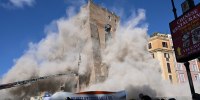Dust rises due to a second collapse of part of the medieval tower "Torre dei Conti"