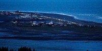 Headlights shine as people evacuate the Spit in Homer, Alaska, following a powerful earthquake in the Aleutian Islands that prompted a tsunami warning on July 22, 2020. 