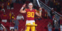 USC Trojans quarterback Sam Huard (80) directs the band after a college football game against the Northwestern Wildcats on November 7, 2025, at Los Angeles Memorial Coliseum in Los Angeles, CA.
