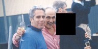 Jeffrey Epstein, Les Wexner and a person who has been redacted pose together in an undated photo.