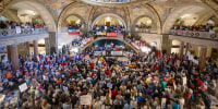 People gather at the Missouri statehouse in Jefferson City to protest redistricting