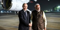 Image: IRussia's President Vladimir Putin is welcomed by Indian Prime Minister Narendra Modi