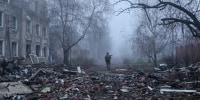 A Ukrainian soldier walks past destroyed buildings in the frontline town of Kostyantynivka, in the Donetsk region on Nov. 28, 2025.