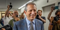 New York City Comptroller Brad Lander walks into immigration court