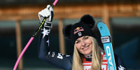 Lindsey Vonn celebrates her victory in the women's downhill race in St. Moritz, Switzerland, on Dec. 12, 2025. 