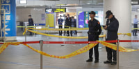 Police cordoned off the scene after a knife attack in Taipei, Taiwan